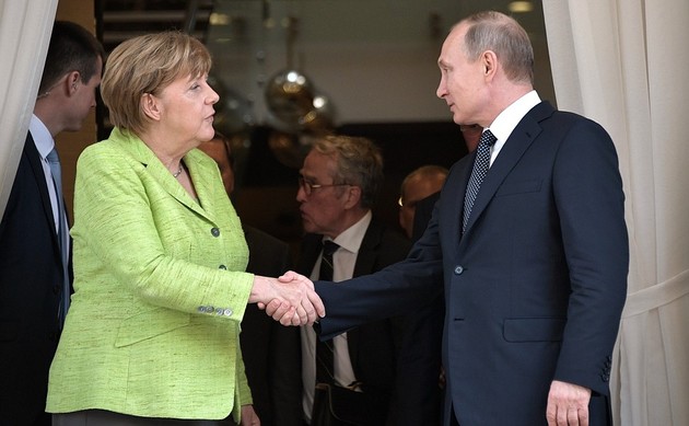 Путин и Меркель обсудили перспективы саммита "нормандской четверки"