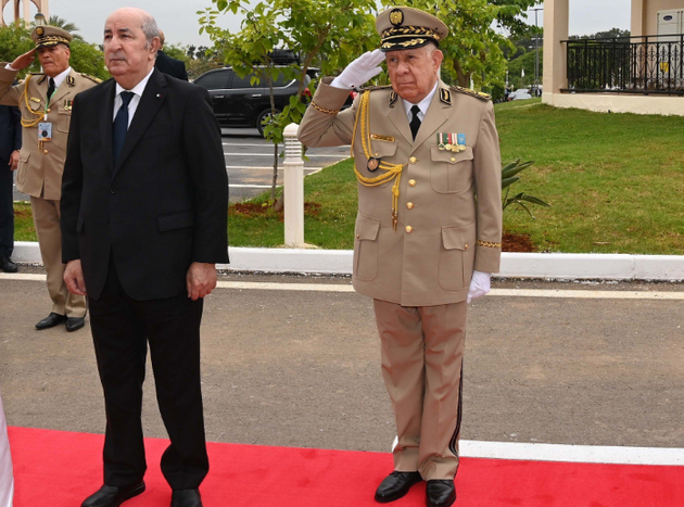 президент Алжира (слева)