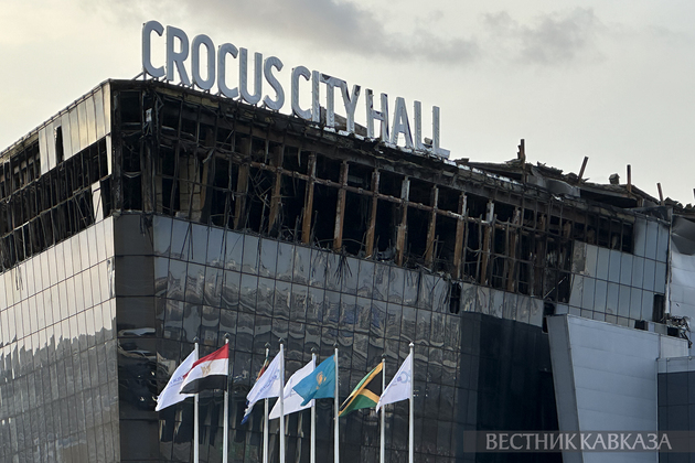 Здание концертного зала Крокус Сити Холл, где произошла стрельба и начался пожар