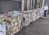 Астраханские коммунальщики возмутились книгами в помойке 