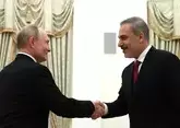 Путин принял главу МИД Турции в Москве