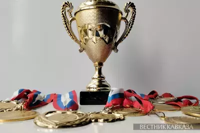 Медали и кубок